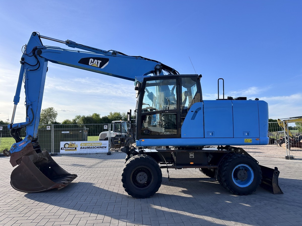 CATERPILLAR M 318 F Oil Quick OQ 65 Deutsche Maschine Top ! - Hjulgravemaskine: billede 1 CATERPILLAR M 318 F Oil Quick OQ 65 Deutsche Maschine Top ! - Hjulgravemaskine: billede 1