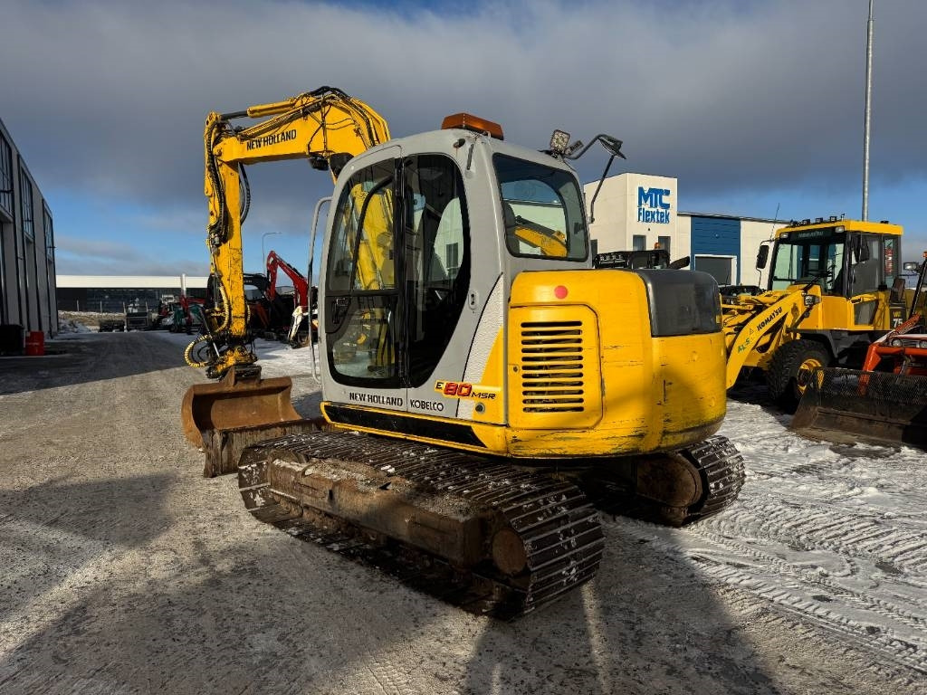 New Holland MYYTY! SOLD! E80MSR PYÖRITTÄJÄLLÄ - Minigravemaskine: billede 3 New Holland MYYTY! SOLD! E80MSR PYÖRITTÄJÄLLÄ - Minigravemaskine: billede 3