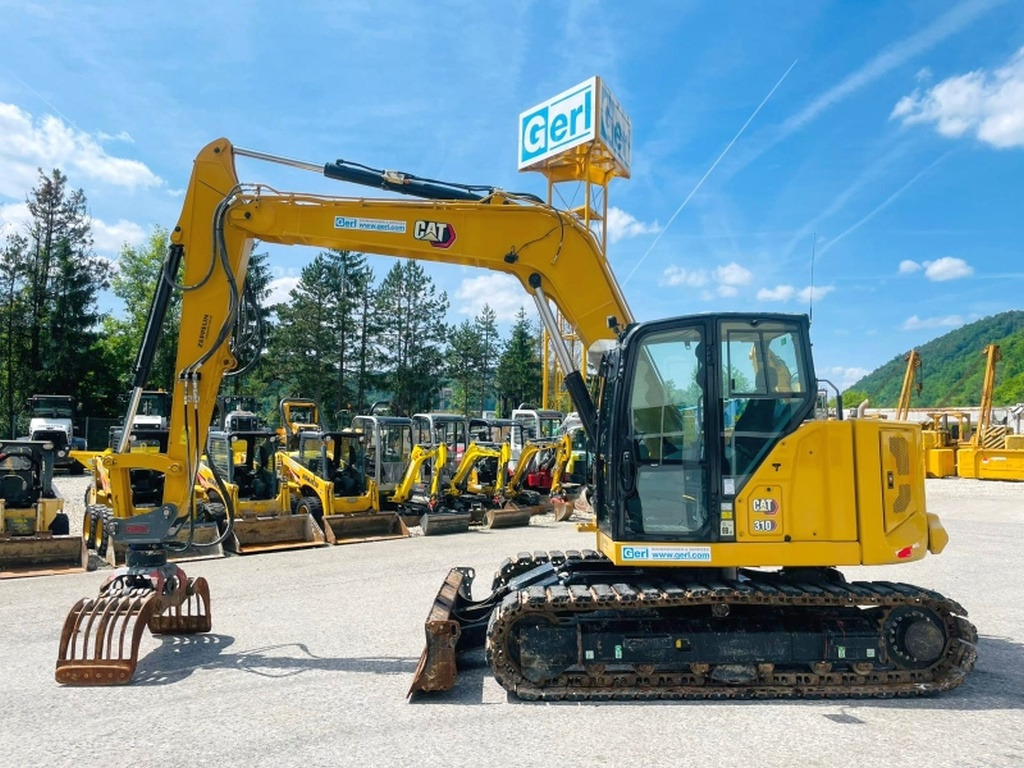 Caterpillar 310 (4011) - Minigravemaskine: billede 1 Caterpillar 310 (4011) - Minigravemaskine: billede 1