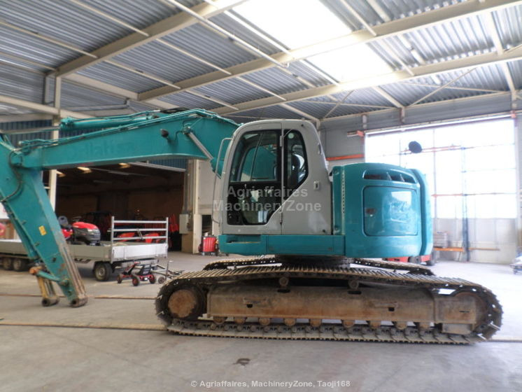 New Holland Kobelco Kobelco E 235 BSR-2 E 235 BSR-2 - Bæltegravemaskine: billede 1 New Holland Kobelco Kobelco E 235 BSR-2 E 235 BSR-2 - Bæltegravemaskine: billede 1